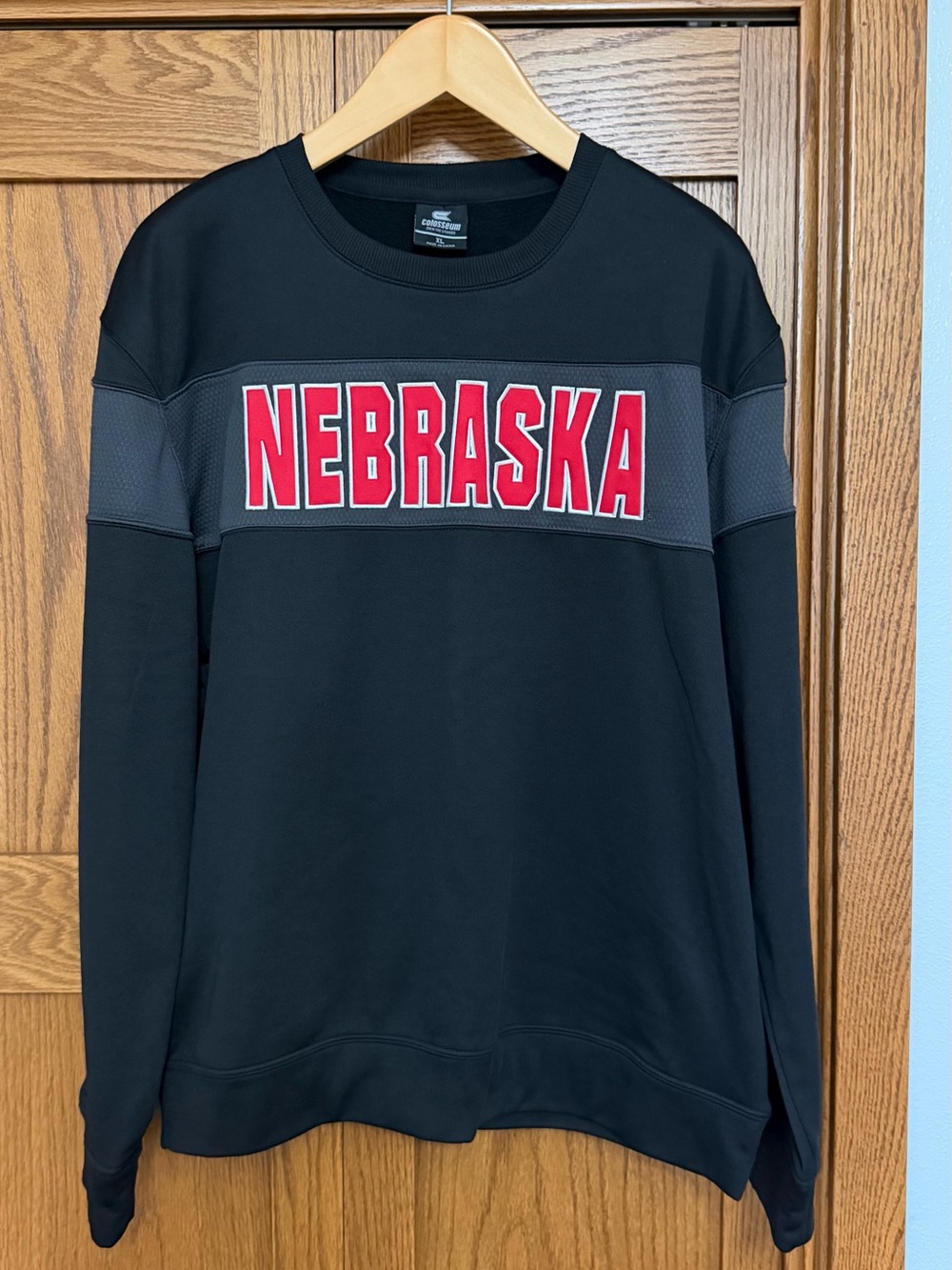 Colosseum Black Crewneck with Red Nebraska Chest Logo
